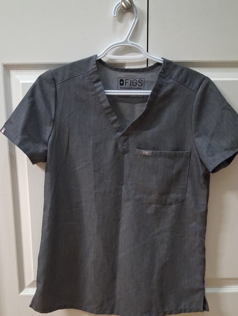 Figs Women's Catarina Scrub Top in Graphite Color.